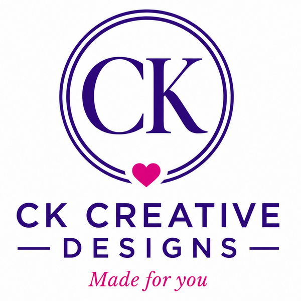 A centered logo on a white background featuring the letters 'CK' inside a double-ring circle, with a small pink heart below. Underneath, the text reads 'CK CREATIVE DESIGNS' in dark purple, and 'Made for you' in pink script.